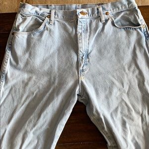 3 pairs of Wrangler Jeans. Tan, Green, and White.